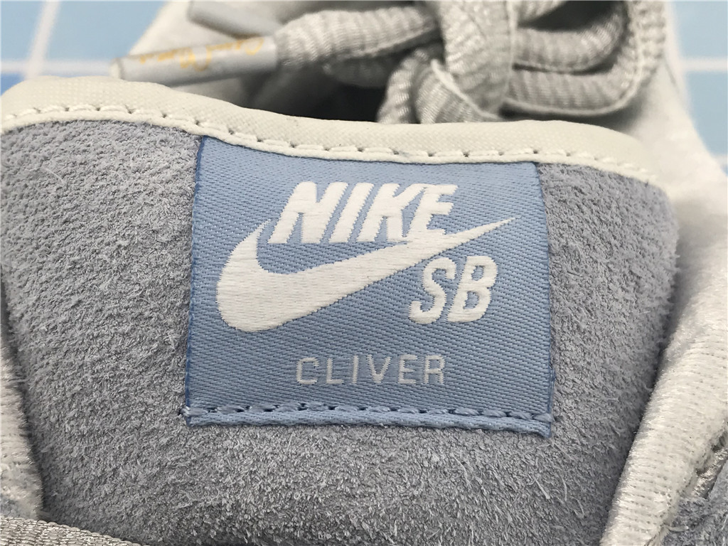 Sean Cliver x Dunk Low SB Holiday Special DC9936 100